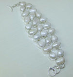 20 Breathtaking Natural Creamy White Biwa Pearls set in .925  Sterling Silver Bracelet